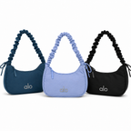 Bolsa deportiva versátil con correa ajustable Disponible en Azul Claro